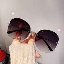 패션 패션 고양이 눈 선글라스 여성의 새로운 고양이 귀 밝은 색 둥근 긴 얼굴 선글라스 테두리없이